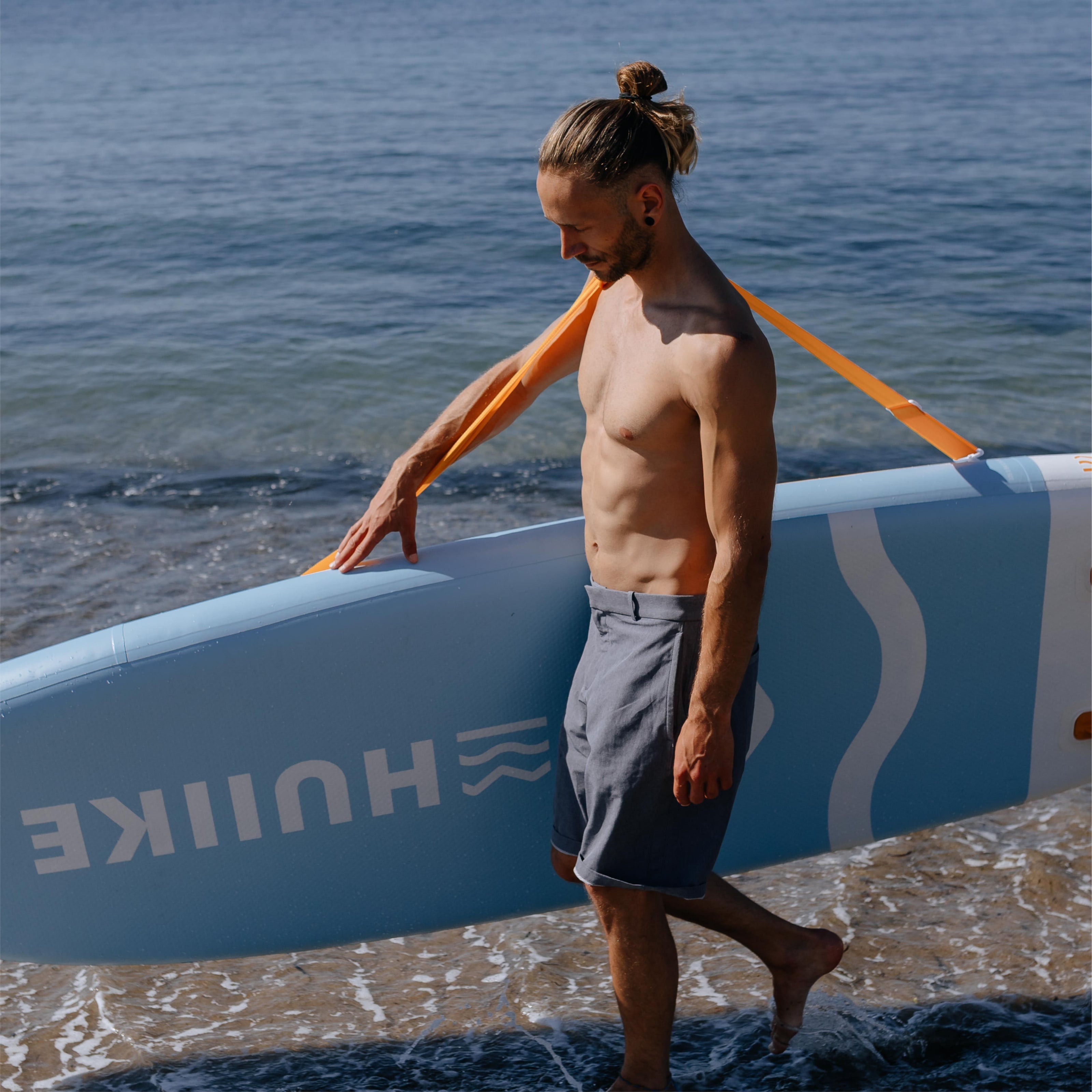 Univerzální popruh pro přepravu prkna na paddle surf